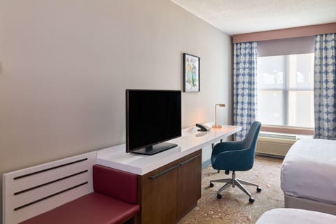 Desk, laptop workspace, blackout drapes, iron/ironing board