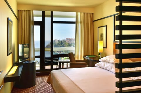 Double or Twin Room, Partial Sea View (Side Sea View) | Minibar, in-room safe, blackout drapes, soundproofing