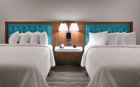 Premium bedding, in-room safe, blackout drapes, soundproofing