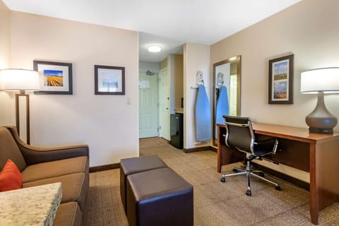 Suite, 1 King Bed, Non Smoking | In-room safe, desk, laptop workspace, iron/ironing board