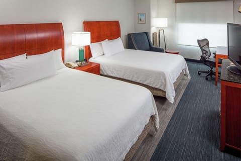 Premium bedding, down comforters, pillowtop beds, in-room safe