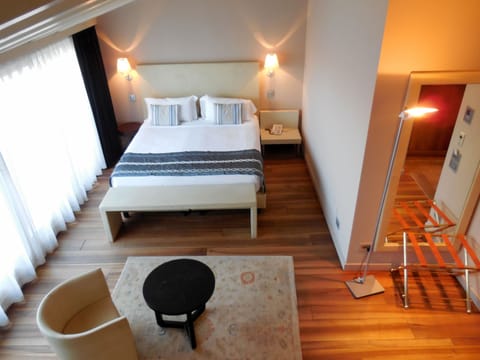 Suite, Partial Lake View (Prestige) | Down comforters, minibar, in-room safe, soundproofing