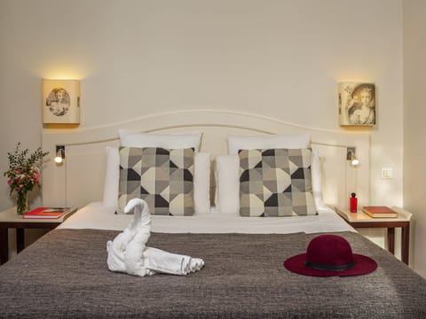 Select Comfort beds, free minibar items, in-room safe, blackout drapes