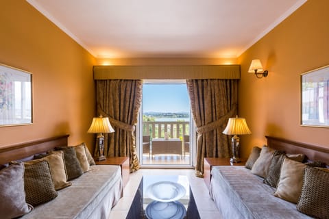 Suite, 1 Bedroom, Lake View | Living area | TV