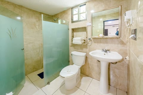 Standard Room, 2 Double Beds | Bathroom | Shower, free toiletries, towels