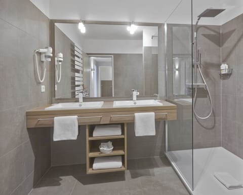 Standard Suite, 1 Bedroom, Kitchenette | Bathroom | Shower, hair dryer, bathrobes, towels