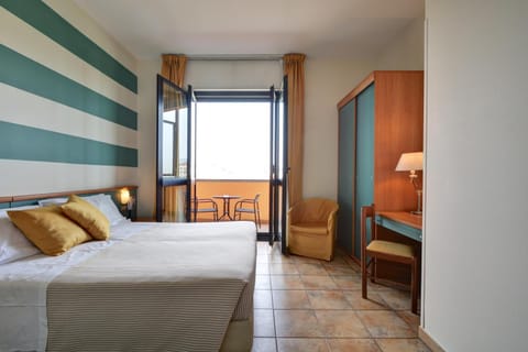 Down comforters, desk, laptop workspace, blackout drapes