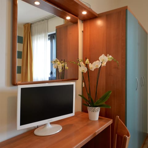 Down comforters, desk, laptop workspace, blackout drapes