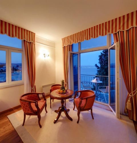 Superior Double Room, Balcony, Sea View | Minibar, in-room safe, desk, laptop workspace