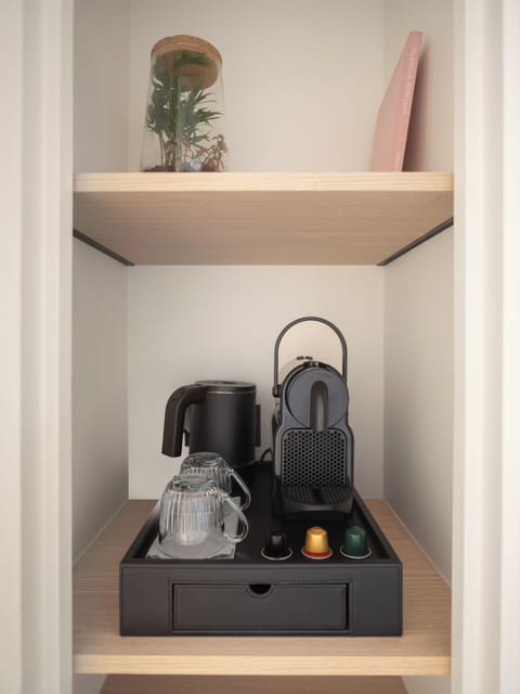 Free minibar, in-room safe, desk, iron/ironing board