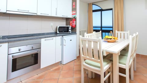 Apartment, 3 Bedrooms, Sea View | Private kitchen | Mini-fridge, microwave, oven, coffee/tea maker