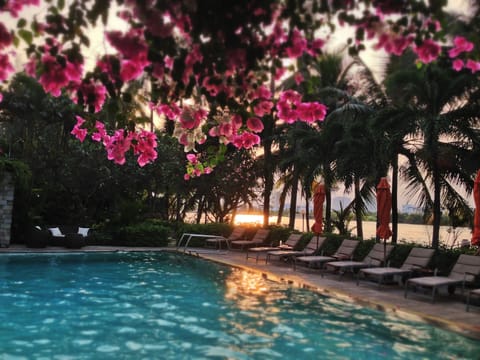 Outdoor pool, pool umbrellas, sun loungers