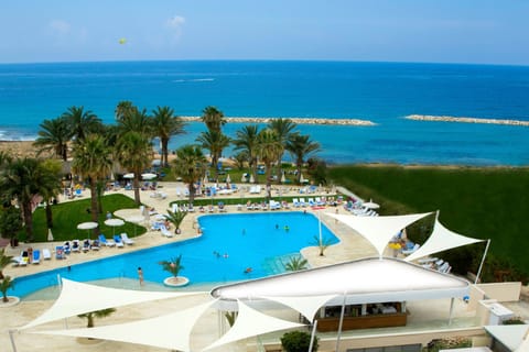 Outdoor pool, open 10:00 AM to 6:00 PM, pool umbrellas, sun loungers