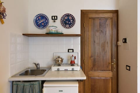 Fridge, stovetop, cookware/dishes/utensils