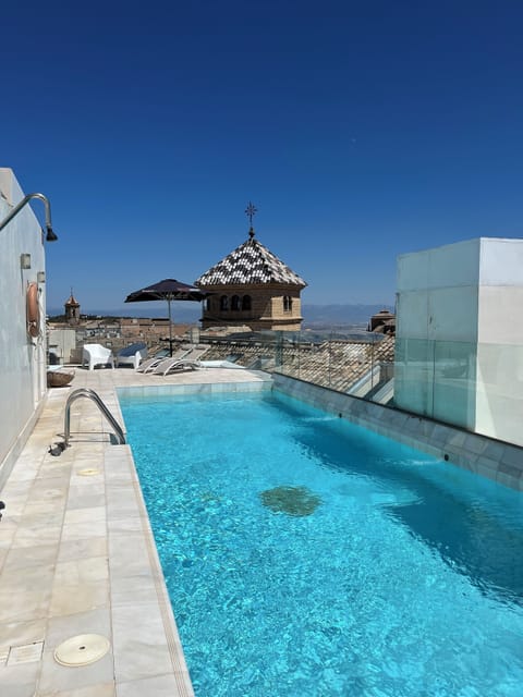 Seasonal outdoor pool, pool umbrellas, sun loungers