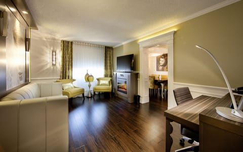 Corporate Suite, 1 Queen Murphy Bed | Living area | Flat-screen TV