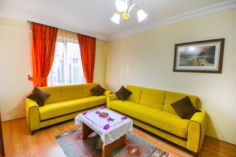 Apartment, 1 Bedroom | Living area | LCD TV