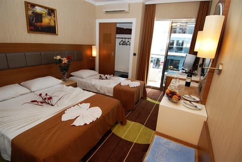 Triple Room | Premium bedding, minibar, in-room safe, desk