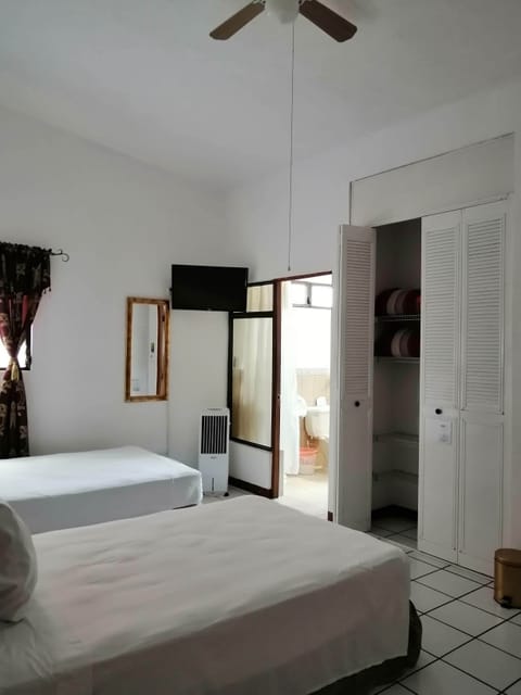 Standard Triple Room, 3 Twin Beds, Private Bathroom | In-room safe, desk, free WiFi, bed sheets