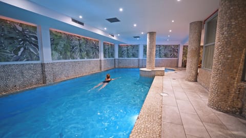 Indoor pool, open 9:00 AM to 9:00 PM, sun loungers