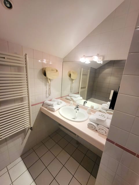 Shower, eco-friendly toiletries, hair dryer, towels