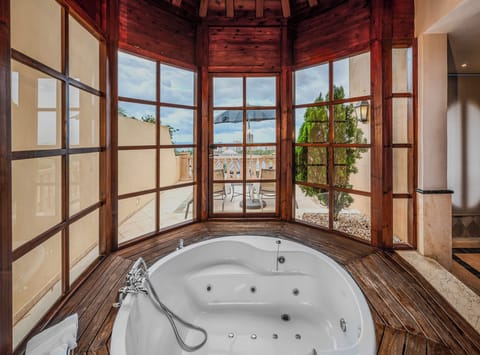 Deep soaking tub, rainfall showerhead, free toiletries, hair dryer