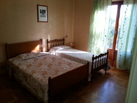 Family Room, 2 Bedrooms, Balcony, Courtyard Area | Premium bedding, down comforters, blackout drapes, iron/ironing board