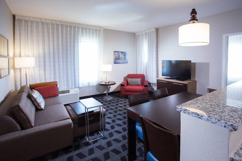 Suite, 2 Bedrooms | Living room | 32-inch Smart TV with digital channels, TV, Netflix