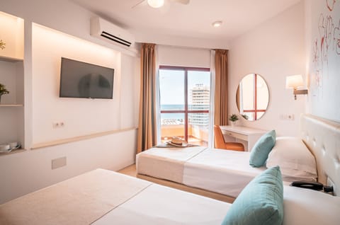 Double or Twin Room, Terrace, Sea View | In-room safe, free WiFi, bed sheets