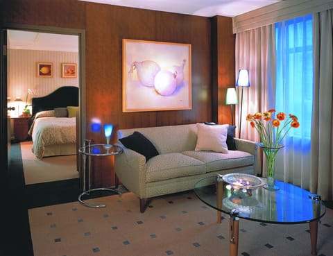 Studio Suite, 1 Bedroom | Living room | 55-inch Smart TV with cable channels, TV, iPod dock