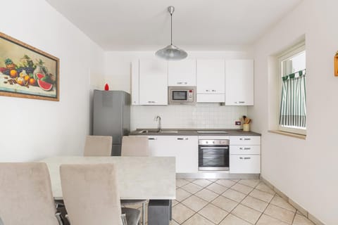 Villa, 2 Bedrooms | Private kitchen | Full-size fridge, oven, stovetop, cookware/dishes/utensils