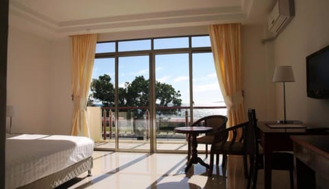 Deluxe King Room, Sea View | Premium bedding, desk, blackout drapes, soundproofing