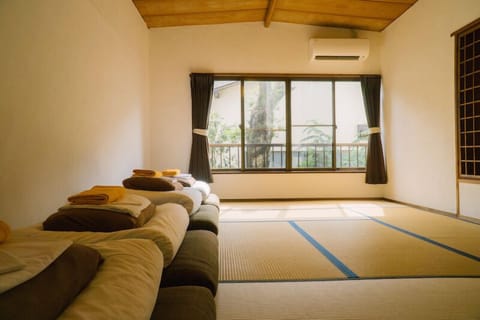 Japanese-Style Quadruple Room | In-room safe, free WiFi, bed sheets