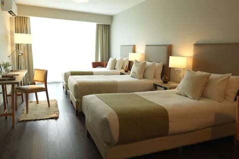 Classic Room, 3 Twin Beds | Free minibar, in-room safe, desk, soundproofing