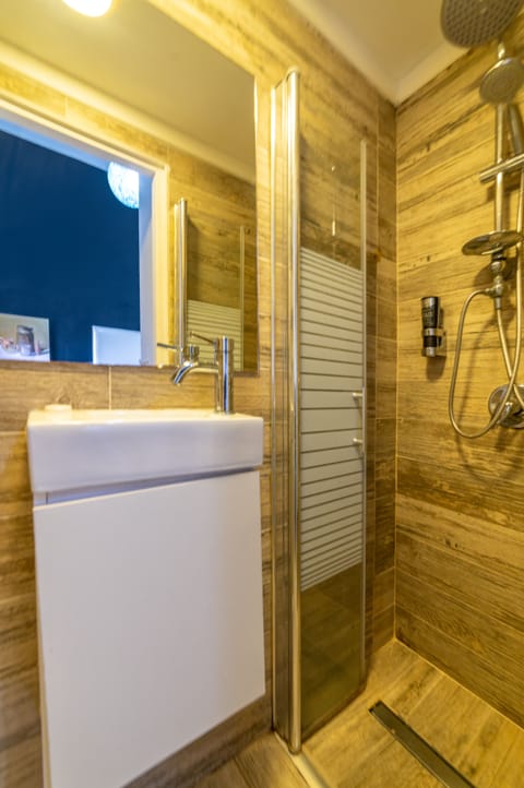 Economy Single Room | Bathroom | Designer toiletries, hair dryer, towels, soap