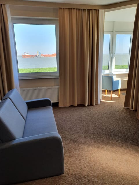 Junior Studio Suite, 1 Queen Bed, Non Smoking, Sea View | Living area | Tablet