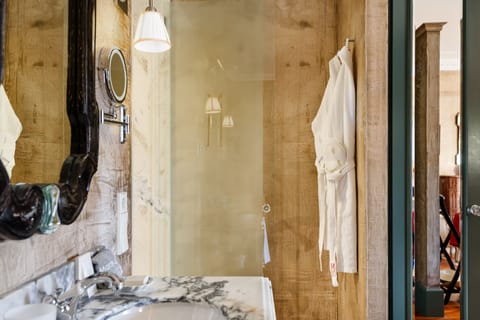 Suite, City View | Bathroom | Shower, free toiletries, hair dryer, bathrobes