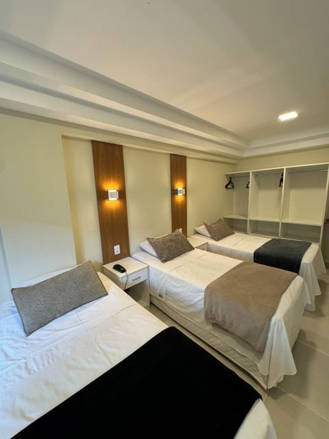 Standard Triple Room | Minibar, desk, blackout drapes, free WiFi