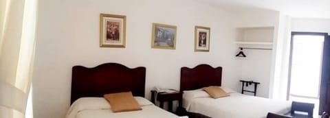 Standard Triple Room, 3 Twin Beds | Desk, iron/ironing board, free WiFi, bed sheets