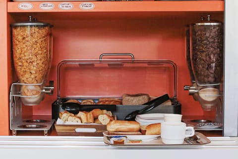 Standard Room, 3 Twin Beds (Shared Bathroom) | Breakfast area | Daily continental breakfast (EUR 6.90 per person)