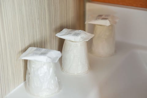 Shower, eco-friendly toiletries, towels