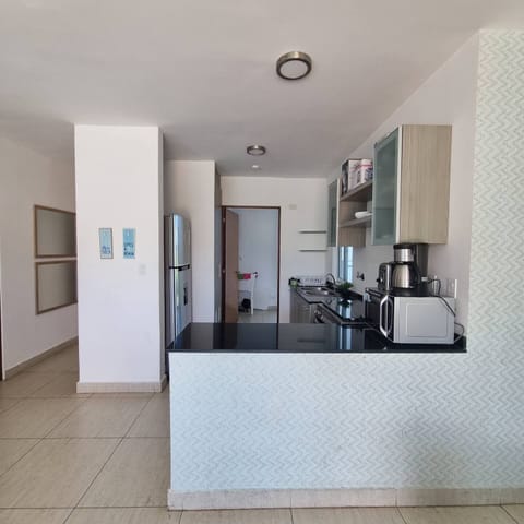 Economy Apartment, 2 Bedrooms, Non Smoking, Partial Sea View | Private kitchen | Full-size fridge, microwave, stovetop, coffee/tea maker