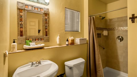 Deluxe Room | Bathroom | Designer toiletries, hair dryer, towels