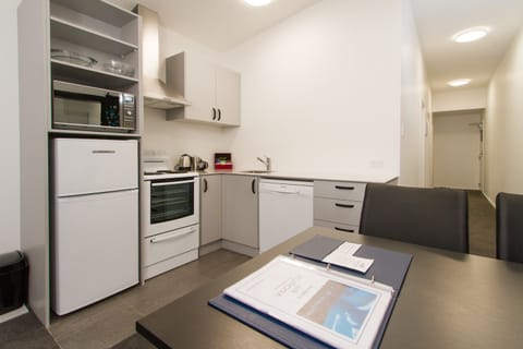 Premier Suite, 2 Bedrooms | Private kitchen | Fridge, microwave, coffee/tea maker, electric kettle