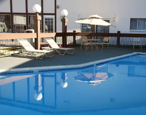 Seasonal outdoor pool, open 9 AM to 10 PM, sun loungers