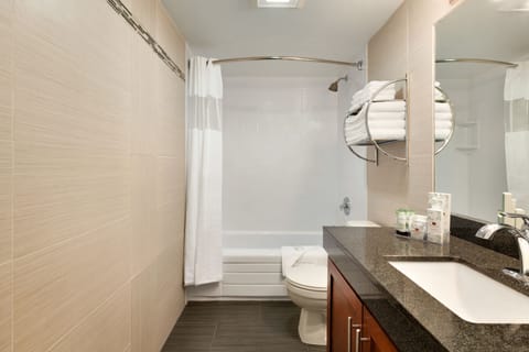 Kitchen Suite | Bathroom | Combined shower/tub, free toiletries, hair dryer, bathrobes