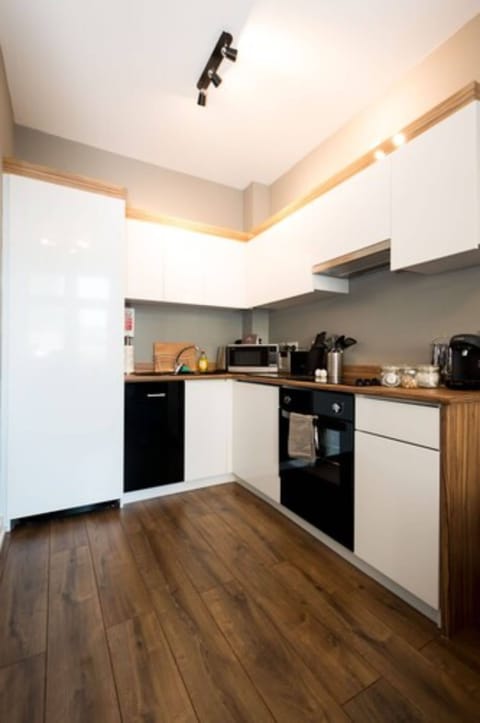 Apartment, 1 Bedroom | Private kitchen | Fridge, microwave, coffee/tea maker, electric kettle