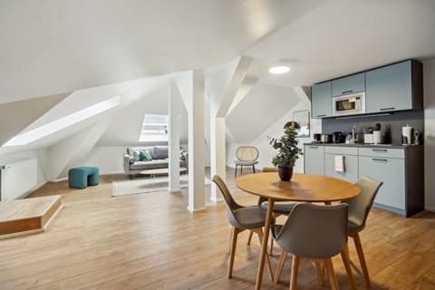 Two-Bedroom Attic Suite | Living area | Flat-screen TV, DVD player