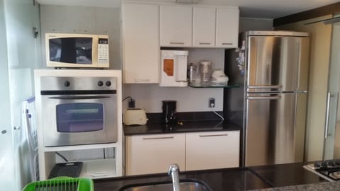 Standard Apartment, 1 Bedroom, Partial Sea View | Private kitchen | Fridge, microwave, stovetop, toaster