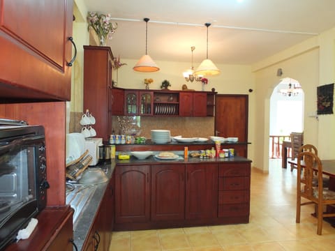 Family Villa, 5 Bedrooms | Private kitchen | Fridge, microwave, oven, coffee/tea maker